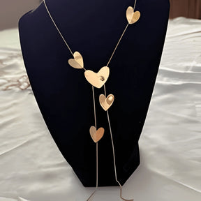 Zynelle Medalha Dourada Longa – Elegância Internacional Para Mulheres de Personalidade