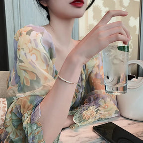 Bracelete Zynelle Gótico Bambu Zirconia Ouro – Mistério Dourado