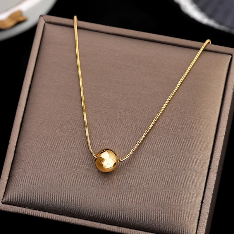 Colar Esfera Minimalista Zynelle – Sofisticação em Aço Titânio